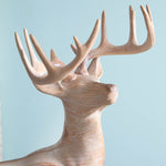 Kneeling Deer Sculpture